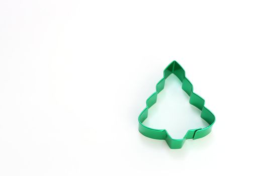 cookie cutter in the shape of a Christmas tree