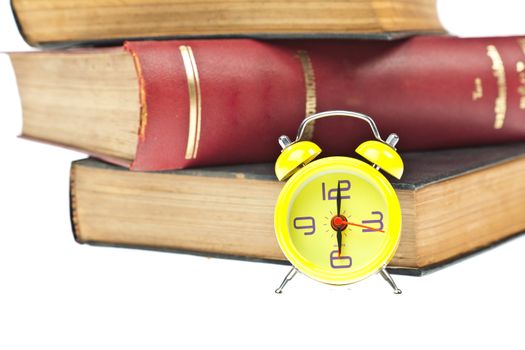 Clock and book as time management concept