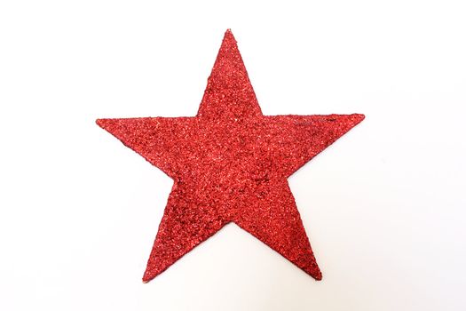 a red glitter star isolated on white background