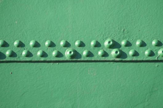 Green detail of a ship in Hamburg harbour. Maritime background abstract.
