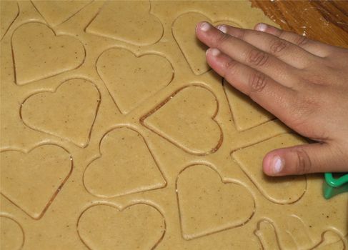 kid making cake figures