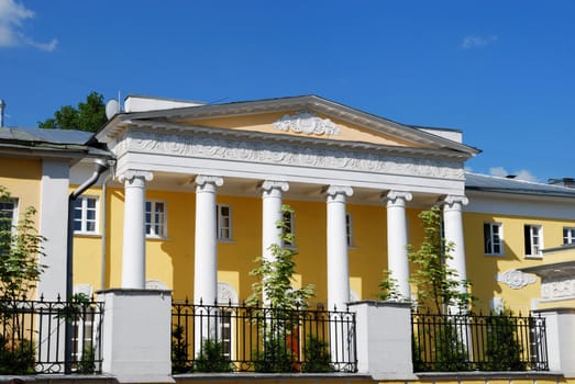 Historical building with white columns in moscow, russia