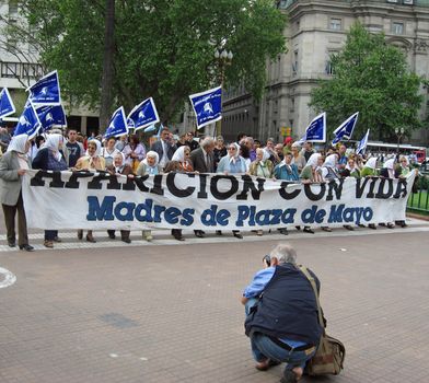 Mothers and grandmothers of kidnapped children marching in the Plaza de Mayo in Buenos Aires, Argentina. 