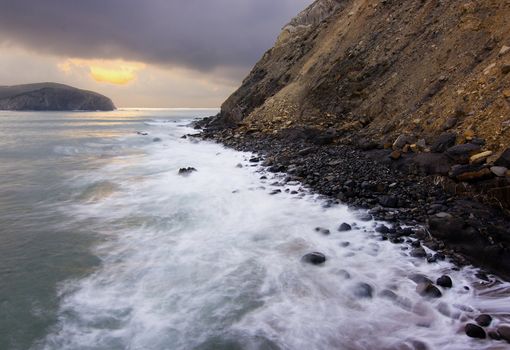 Calm image of the rocks in the sea shore