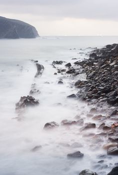 Calm image of the rocks in the sea shore