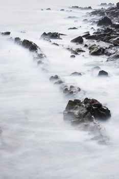 Calm image of the rocks in the sea shore