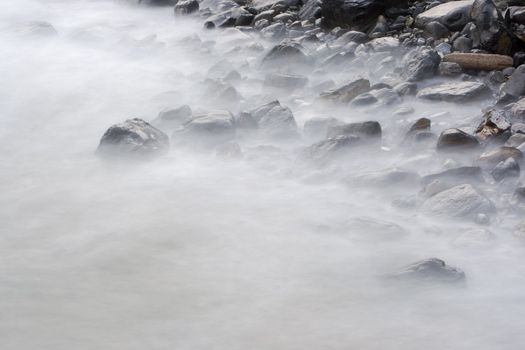 Calm image of the rocks in the sea shore