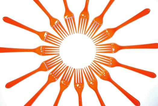 Sun made of Orange Plastic Forks