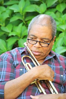 African american male trumpet player.