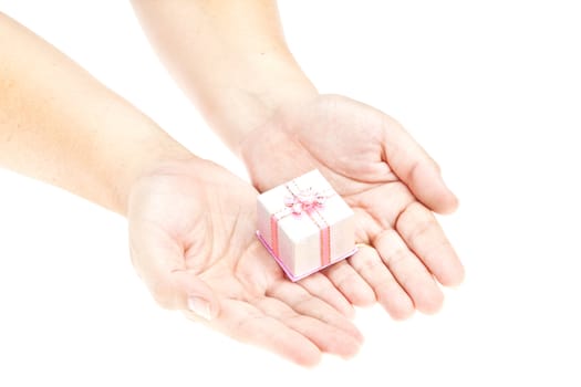 hand and gift over white background