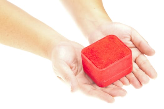 hand and gift over white background