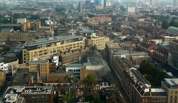 An aerial view of the cityscape of London.
