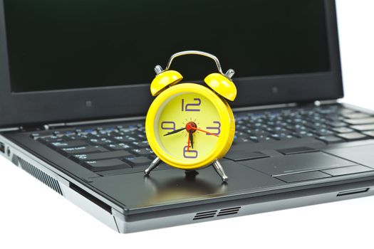 Clock on Notebook as time management concept