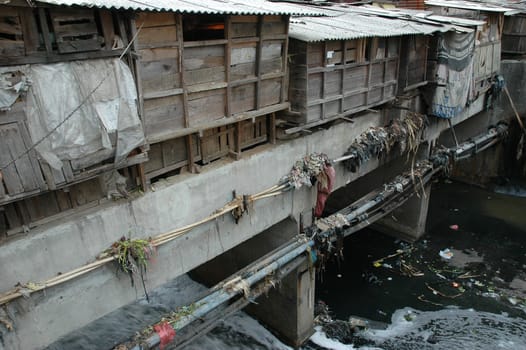 portrait of slum area below pasupati bridge in bandung