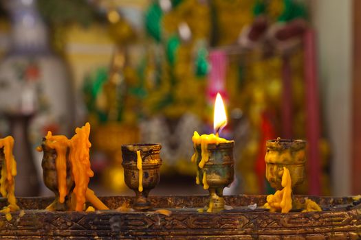 Candles lighting in temple