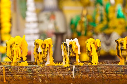 Candles melting in temple