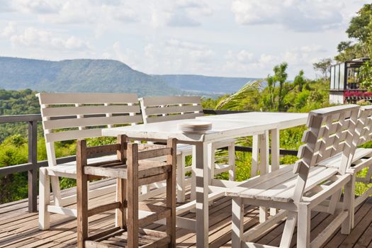 Dining table on terrace and, mountain view