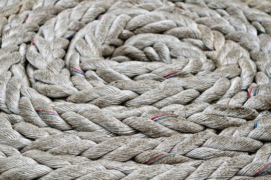 Heavy twisted rope on the floor of sailboat