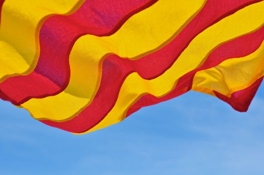 Maritime signal flag against the blue sky