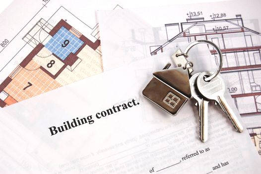 Keys on building contract and blueprints