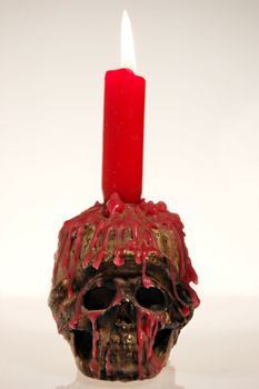 Spooky skull - candle holder. With candle.