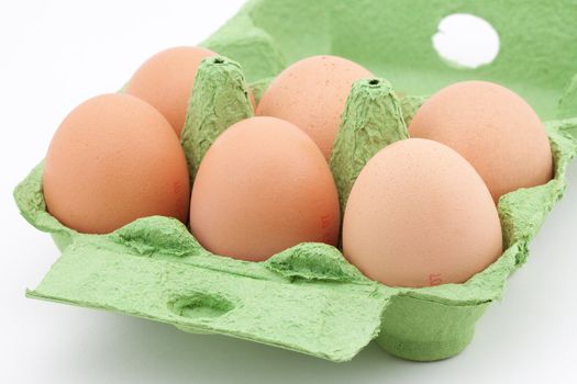 High Quality Eggs in a green carton.. ideal for bio topics..