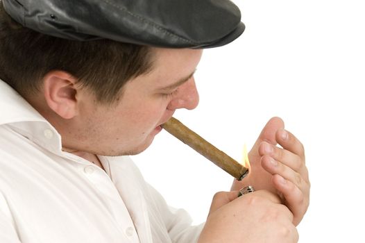 Macho man smoking cigar. Portrait over white background.