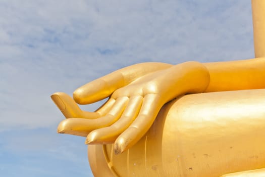 Big Golden Buddha hand statue in Thaland temple