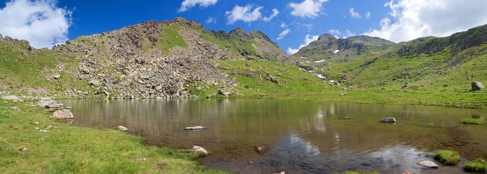 summer view of Lusia lakes, in val di Fassa, Italian dolomites. Photo taken with polarized filter