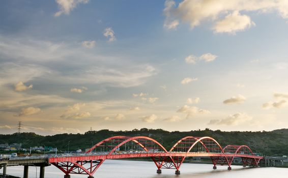 It is a beautiful cityscape of bridge with blue sky.