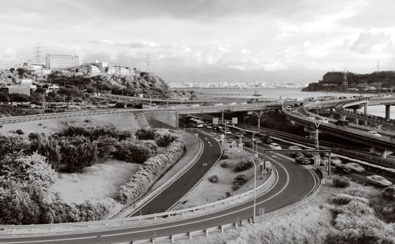 It is a beautiful cityscape of interchange and cars.