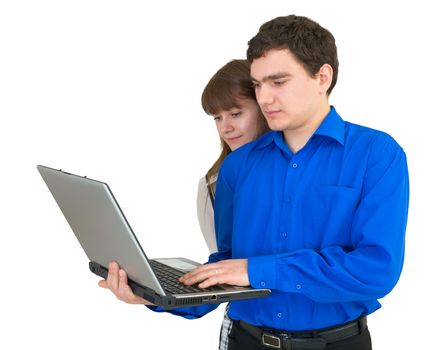 Young couple with the laptop in hands