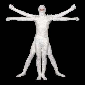 Vitruvian Man - bandaged mummy isolated on black background
