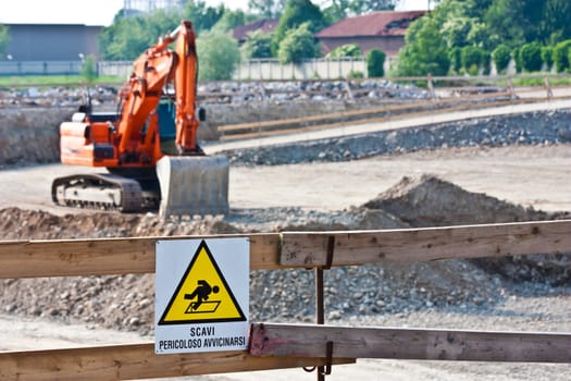 Sign of danger for work in progress (Italian) in a building site