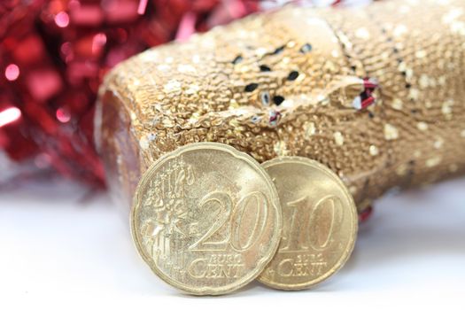 Shinny euro coins and a champagne bottle detail, happy new year!