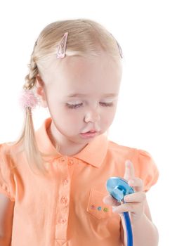 Shot of little girl with sthetoscope on  hand