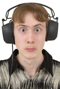 The amusing young man in ear-phones with protruding eyes