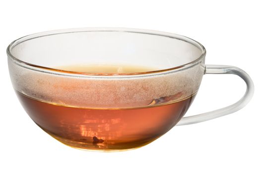 Transparent glass cup with tea inside on a white background