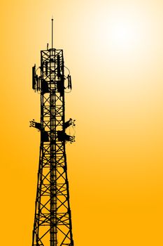 Mobile phone communication repeater antenna tower as Silhouette background