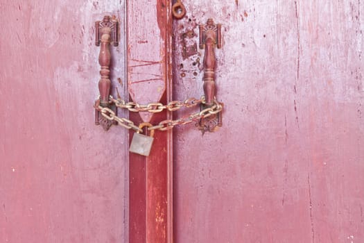 old iron lock with bolt on the door