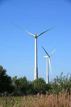 Wind turbines on a background of  blue sky