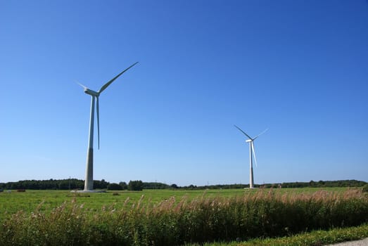 Wind turbines on a background of  blue sky