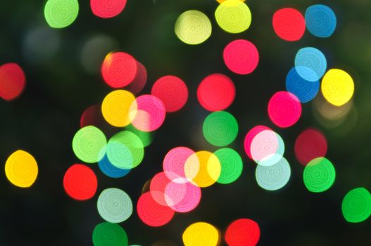 Out of focus multicolored Christmas light background