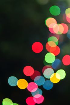 Out of focus multicolored Christmas light background
