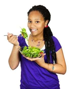 Isolated portrait of black teenage girl with salad bowl