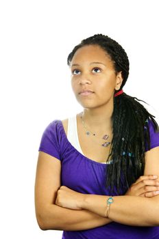 Isolated portrait of  black teenage girl with arms crossed
