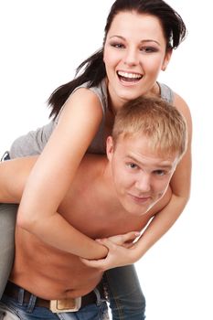 Happy teens couple cuddling over isolated white