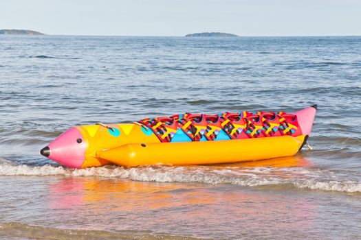 Colorful banana boat with life jacket