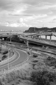 It is a beautiful cityscape of interchange and cars.