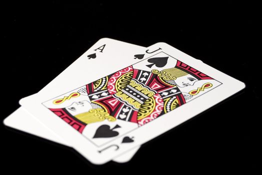 Blackjack cards against black background